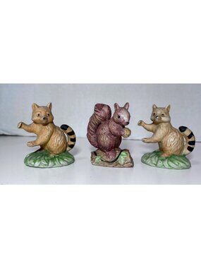 Lot of Bisque Porcelain Squirrels or Mini Ringtail Cat On Grass Trinket